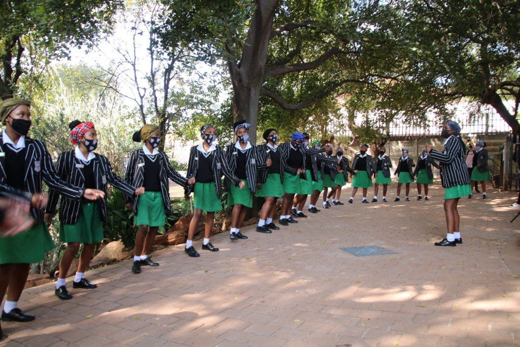 Hlabelela performing outside PAC r